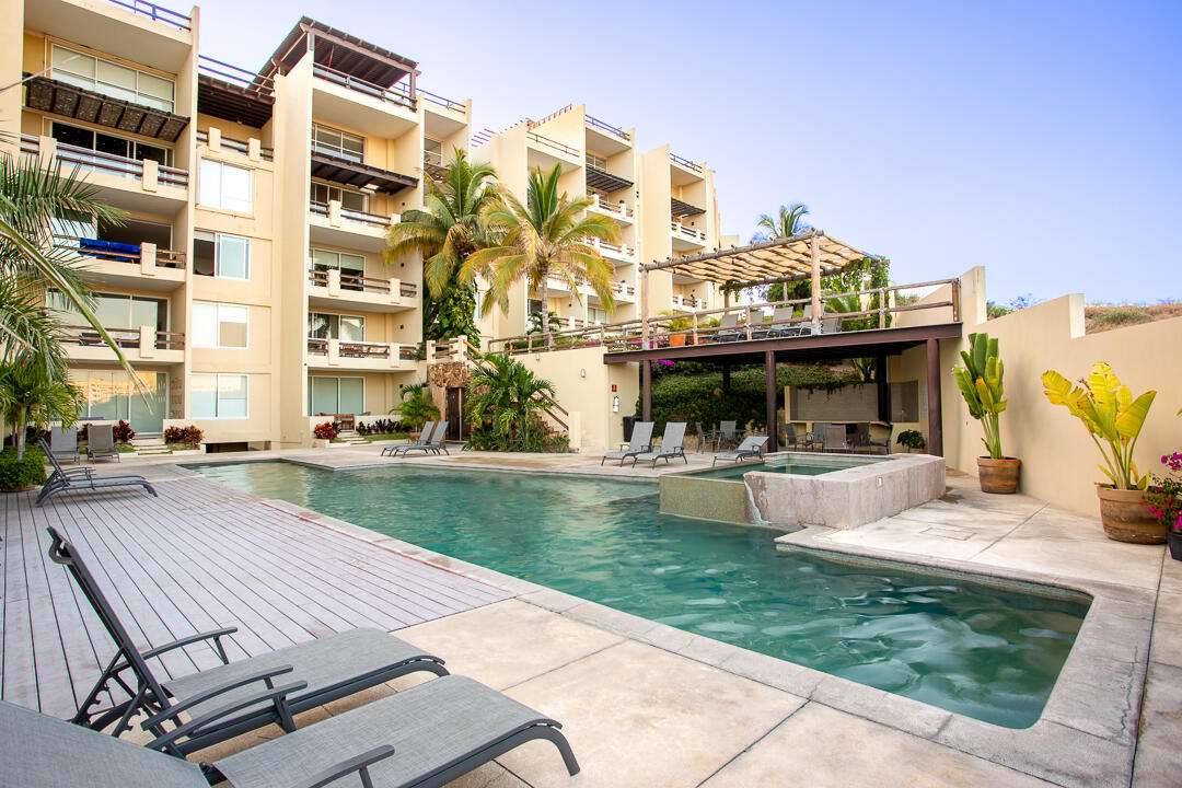 Los Cabos Centro-Sjd This fully furnished 2-bedroom, 2.5-bath penthouse at Cardinal Living offers a comfortable layout and an unbeatable location in San José. The PH features two spacious bedrooms with ensuite bathrooms, an open living area, a fully equipped kitchen, and a convenient half bath for guests. It works well for full-time living or as a high-performing vacation rental.The building includes a rooftop pool with city for sale