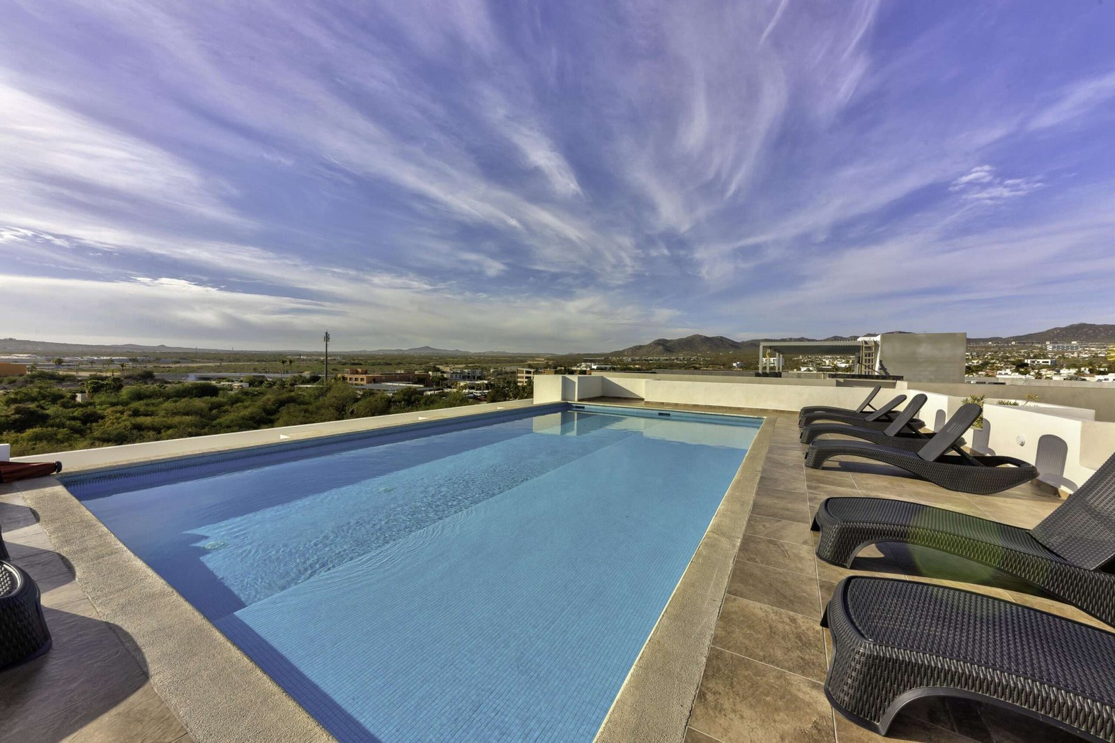 Los Cabos Luxotica Ii Luxotica delivers easy Cabo living in the Sunset area—close to the marina, restaurants, shopping, and beaches. This bright 2 bed / 2 bath third-floor condo comes fully furnished and equipped, ready to move in or rent immediately. Strong rental history makes it ideal for investors, seasonal owners, or full-time living. The unit includes private parking, plus access to a shared rooftop with panoramic for sale