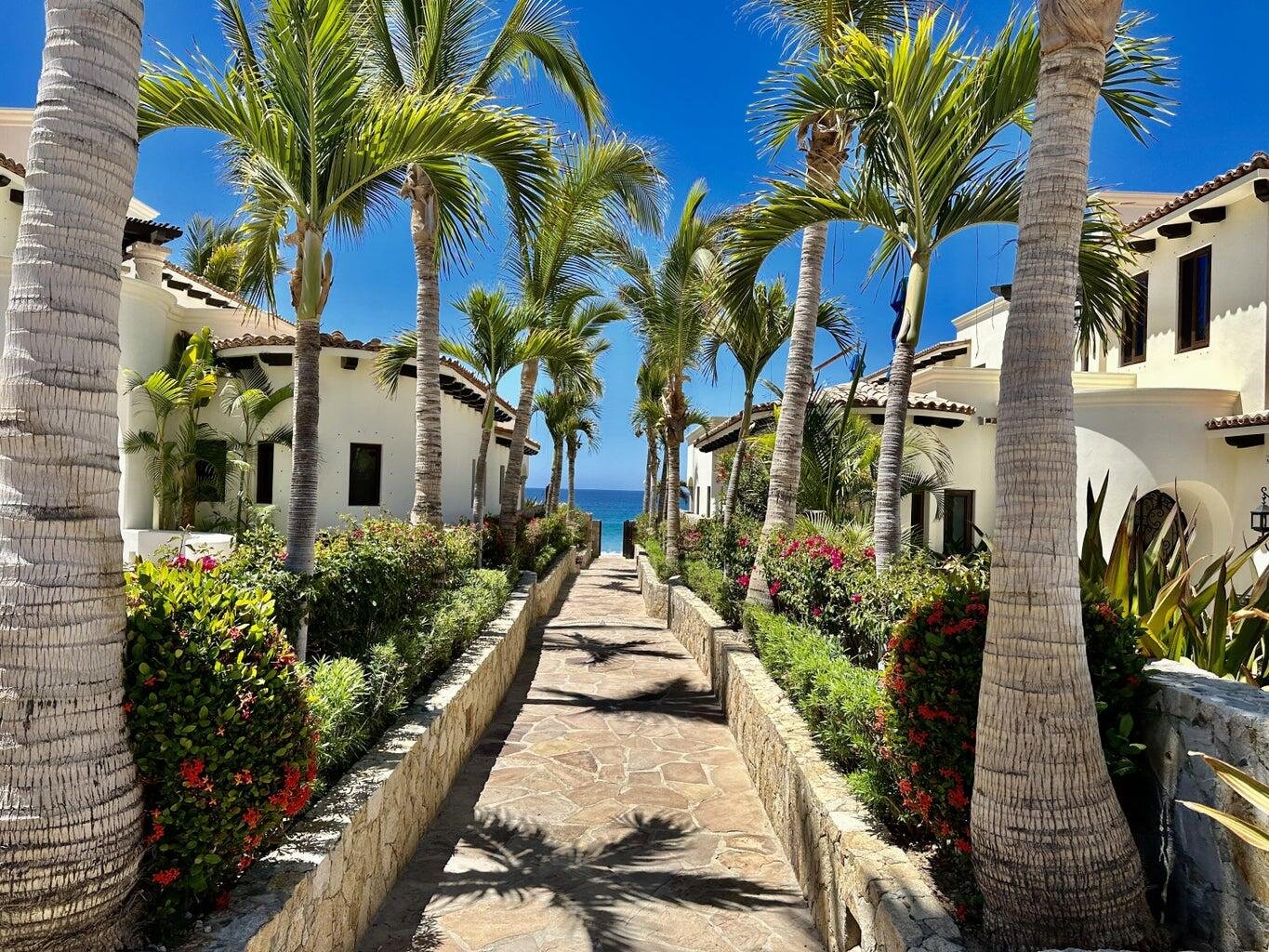 Los Cabos La Jolla Much desired beach front complex with two salt water pools. One pool heated. Lovely gardens, well maintained. Condo is on the second floor with a wrap around terrace overlooking the white sand beach of Costa Azul. It is Very High demand for sale