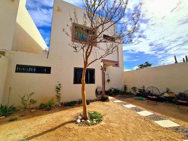 Los Cabos Csl N-E Of19:Genral GREAT INVESTMENT OPPORTUNITY - ENDLESS POSSIBILITIES!Discover the untapped potential of Casa Altezza, a single-family Two-story home nestled in a sought-after residential community - Northern Cabo San Lucas, and conveniently located off Highway 19-Tamaral Ave. What sets this property apart? THE LARGEST LOT in the cluster! Offering unique development potential! Expand the current home, add residential rental-rooms, design a covered garage, or build the ultimate entertainment space with seamless access--this property's extra land is a blank canvas for creativity and investment. Completed in April 2022, Casa Altezza features 3 bedrooms and 2.5 bathrooms, including an ensuite bath in the master bedroom. The home boasts a spacious front patio with mature plants and trees, along w/a back patio including concrete flooring.Several thoughtful upgrades include: - Custom-designed kitchen with a modern, minimalist concept and an expanded window for ample natural light. - Enclosed bonus room for laundry and storage. - High 2.5-meter privacy walls surrounding the property. - Iron-protected doors and windows with installed screens. - Abundant water supply with a total of 23,700 liters, including two cisterns and a rooftop water tank. - New appliances, including a full-size washer & dryer, stove, hood, refrigerator, two inverter mini-splits, and ceiling fans.Casa Altezza sits in an ideal location, just 10 minutes from downtown Cabo San Lucas, Medano Beach, Puerto Paraiso Mall, and The Marina. Daily conveniences like supermarkets, shopping centers, medical facilities, and schools are just minutes away. Plus, the community is a gated neighborhood with electronic access, and a remarkably low HOA monthly fee of only – EXPANSIVE LOT, Cabo San Lucas, BS