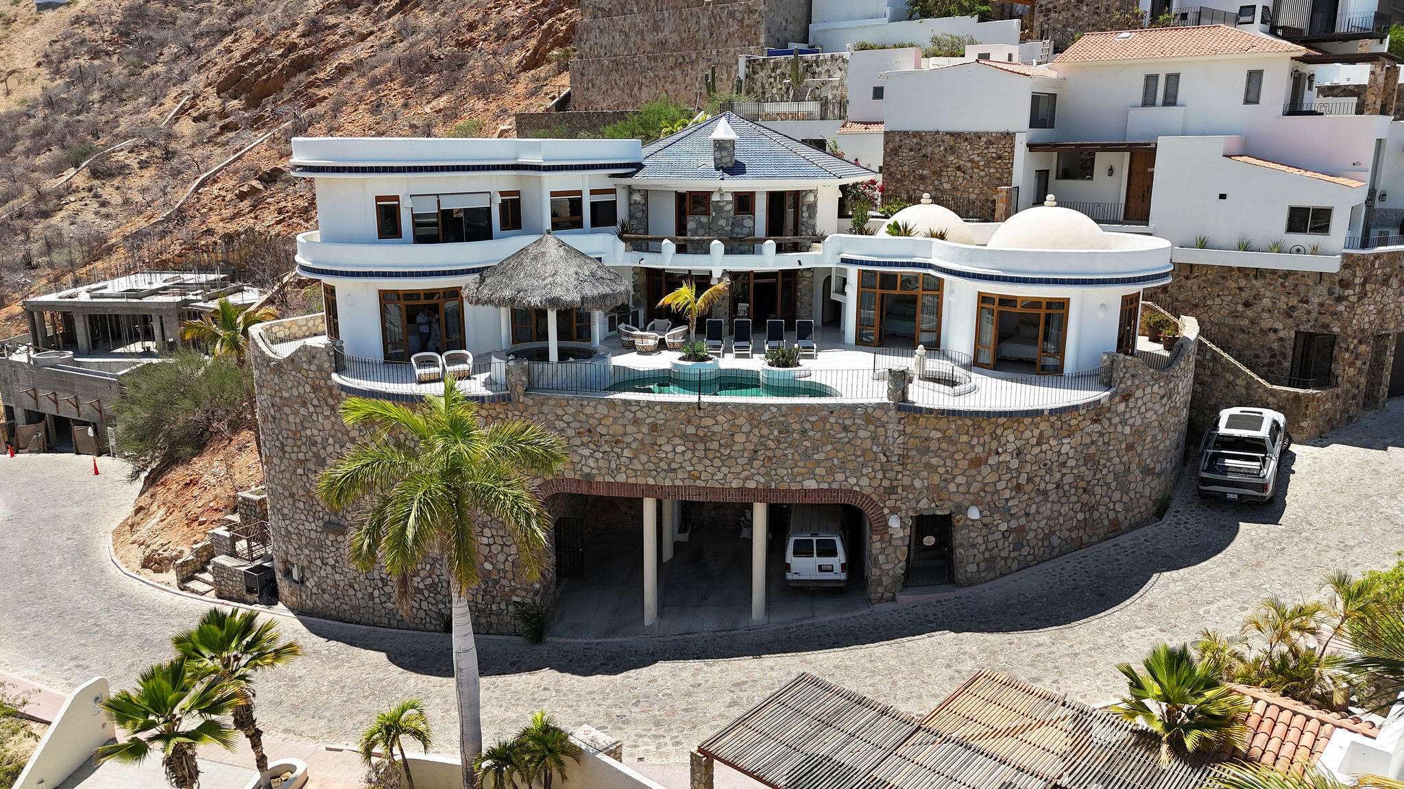 Los Cabos Pedregal Csl Commandingly positioned in the exclusive enclave of Pedregal, Casa El Castillo offers rare walkable proximity to downtown alongside total hillside privacy. This 6-bedroom, 7.5-bathroom architectural estate--originally built by fitness icon Ray Wilson--was masterfully oriented to maximize its vantage point. The result is a breathtaking, unobstructed panorama spanning the Cabo San Lucas Marina, vibrant city lights, and dramatic for sale