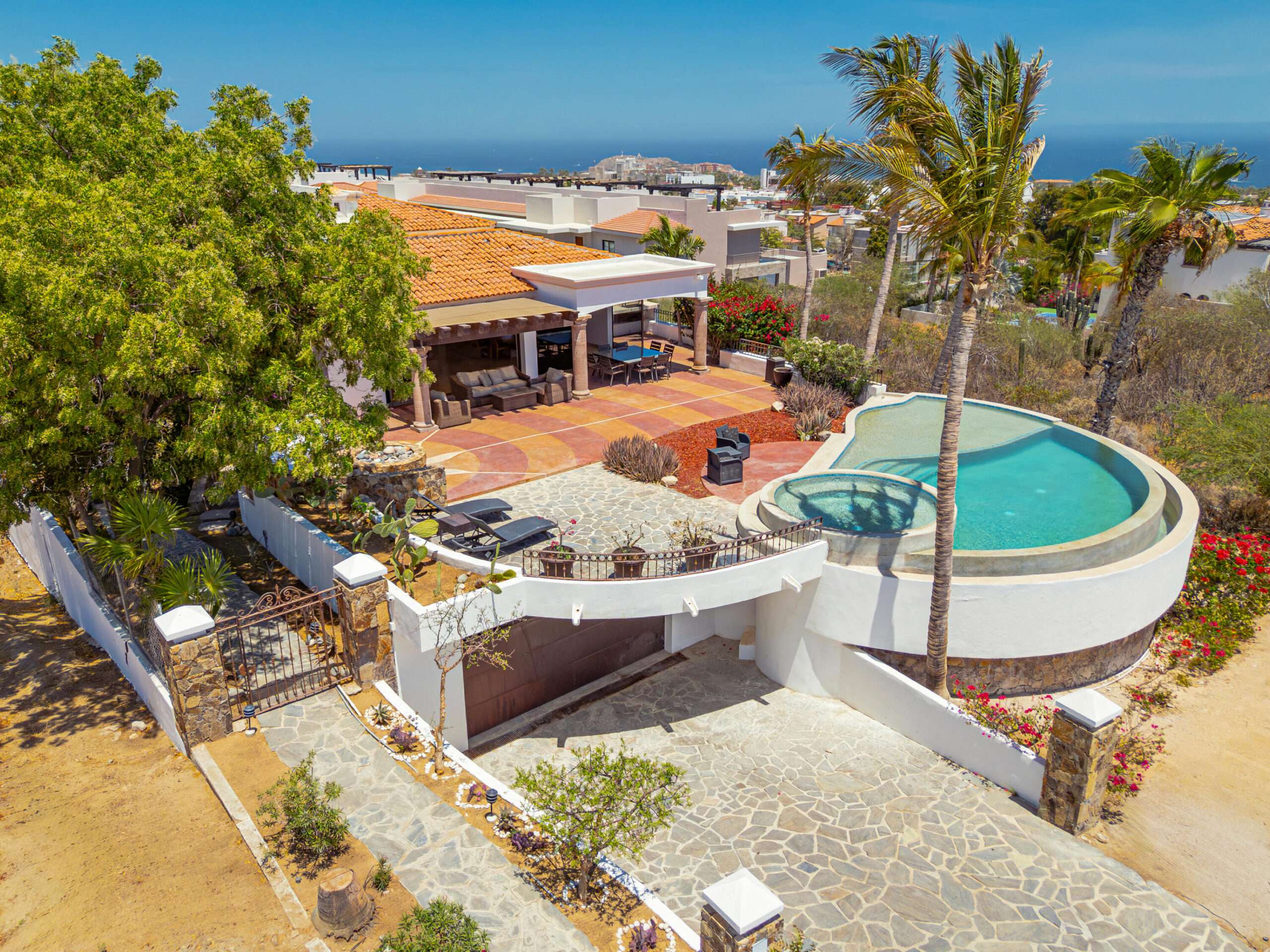 Los Cabos Pedregal Csl Villa Felicidad is a 5-bedroom, 5.5-bath residence in Pedregal that combines scale, location, and proven income potential. Set just minutes from the main gate and within walking distance to the marina, it offers effortless access to Cabo's best dining and nightlife while maintaining privacy. The home features a private pool, expansive terraces, and panoramic marina for sale