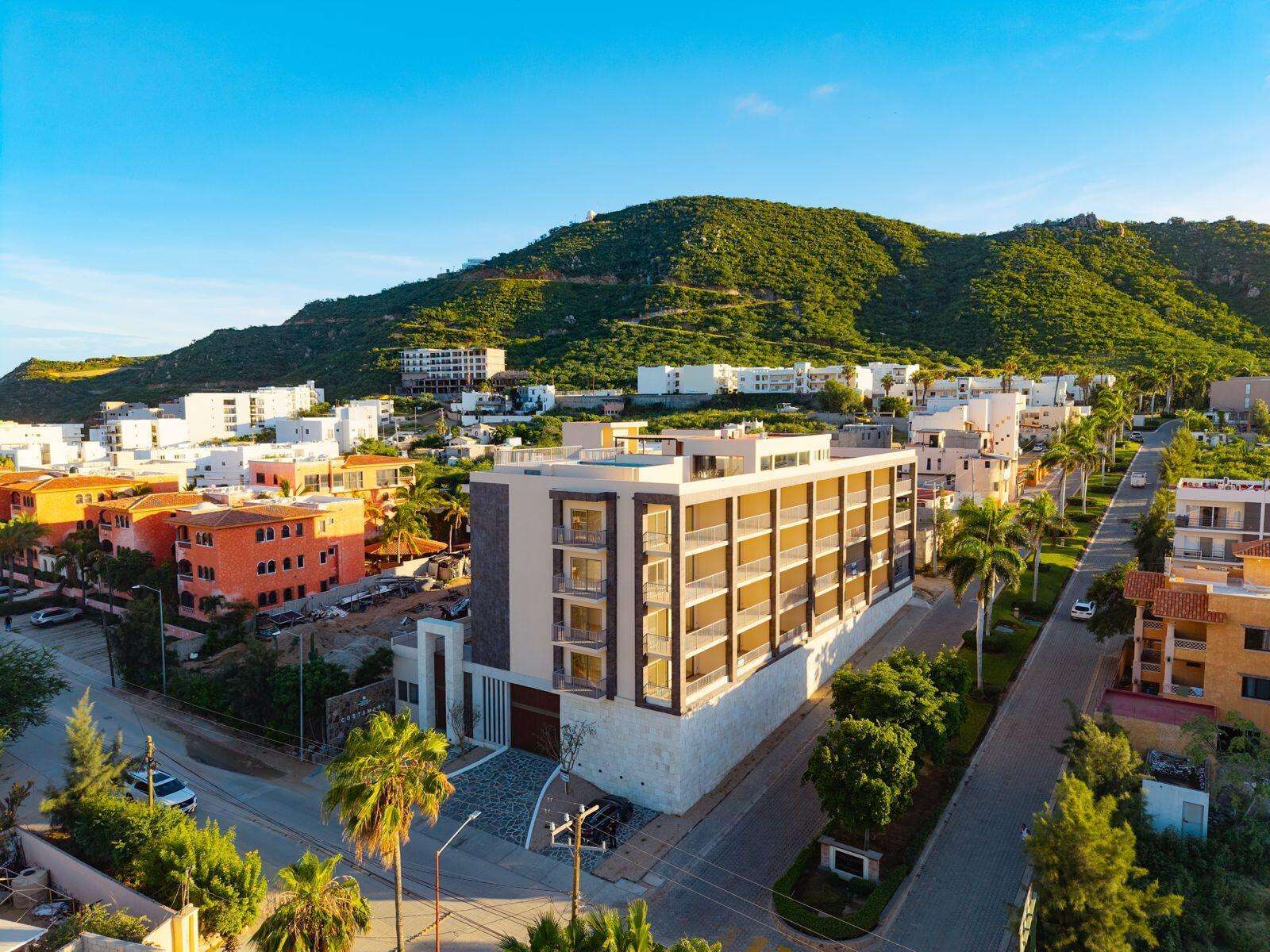 Los Cabos Aura This is the smallest residence in the entire development, designed to offer an exceptional opportunity to own a two-bedroom home within 100 m² (1,071 sqft) of interior space, plus a terrace, one parking space, and a small storage unit. It represents the best entry-level price--the most affordable option to acquire a new, modern, beachfront property. The unit features two ocean- for sale
