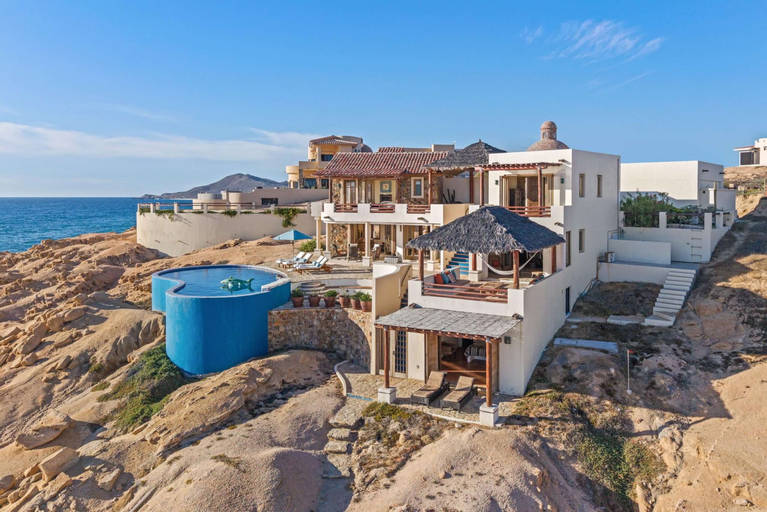 Los Cabos Pedregal Csl Villa Felicidad is a 5-bedroom, 5.5-bath residence in Pedregal that combines scale, location, and proven income potential. Set just minutes from the main gate and within walking distance to the marina, it offers effortless access to Cabo's best dining and nightlife while maintaining privacy. The home features a private pool, expansive terraces, and panoramic marina for sale
