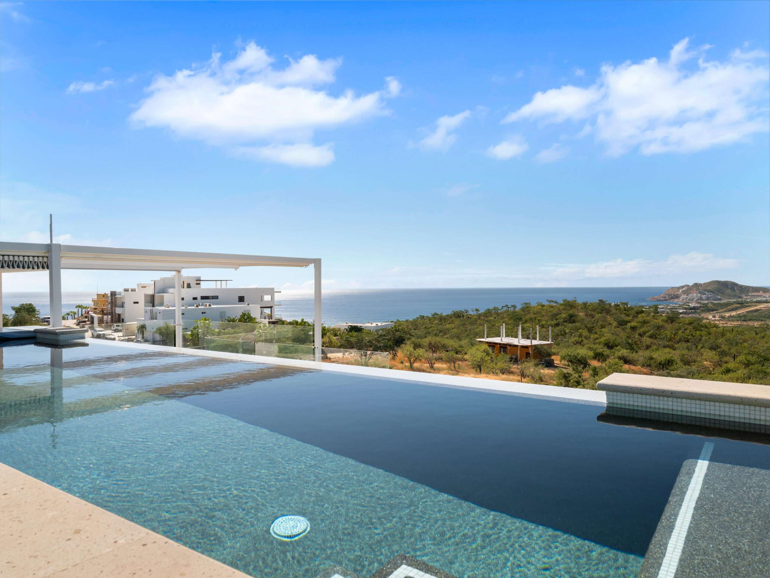 Los Cabos El Tule-Inland:General Rare investor opportunity in the San José Corridor. 2 luxury residences fully completed and move-in ready. 8 additional units with land secured and full blueprints in place -- ready to build to buyer's vision. At for sale