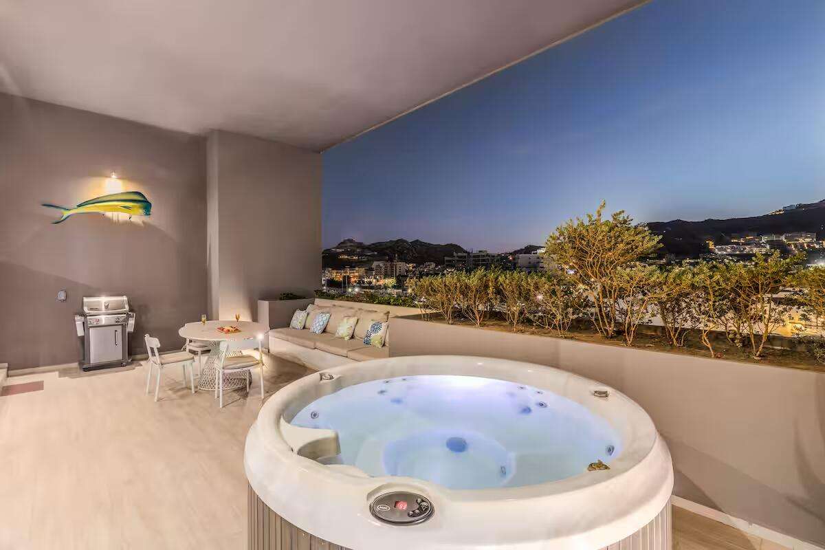 Los Cabos The Paraiso Residences Experience the best location and the luxury with Condo Marina Vista, located at The Paraiso Residences, this modern 2BR/2BA condo is just steps from the world famous Cabo San Lucas Marina, putting you in the heart of the action. Delight yourself with the impressive private terrace, with jacuzzi, grill and much more. With its new and modern taste, Condo Marina Vista is your best option for your second home or investment in Cabo. This condo features modern decor in perfectly lit spaces, fully equipped kitchen with everything you will need, including electric stove, dishwasher, oven, microwave, etc. A spacious and fun living room perfect for entertaining and relaxing, with a comfortable sofa that can make extra sleeping space for one more guest. Two large bedrooms with King size beds and bathroom with shower, both with ample wardrobe space, TV and luxury bedding. The living room is spacious and perfect for entertaining, with a comfortable sofa that can function as an additional sleeping space for one or two more children.Wait until you come out! First open the pocket doors from the living room to the master bedroom to extend your area to the outside terrace with jacuzzi, barbecue and dining for six. Enjoy the huge spacious terrace and its magnificent for sale