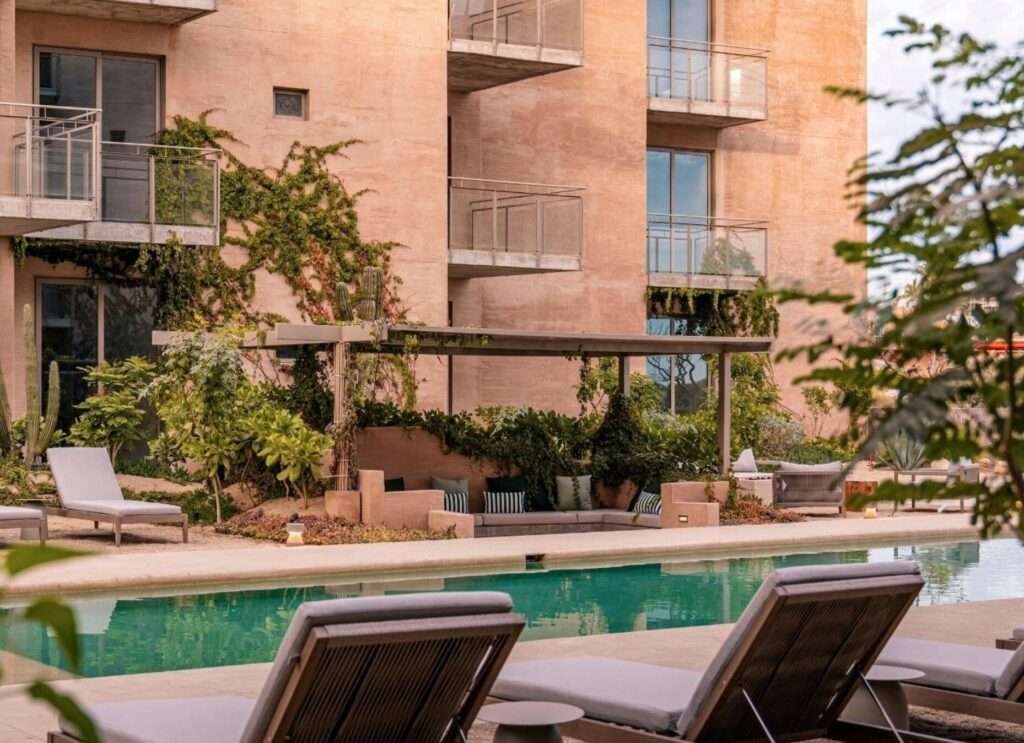 Los Cabos Luxotica Iii Welcome to Sunset Corner Condo 201, a bright and inviting second-floor corner unit in the growing Sunset area of Cabo San Lucas. This 2-bedroom, 2-bathroom condo features an open-concept layout, high ceilings, abundant natural light, and pleasant city and mountain – Vista Vela 3, Cabo Corridor, BS