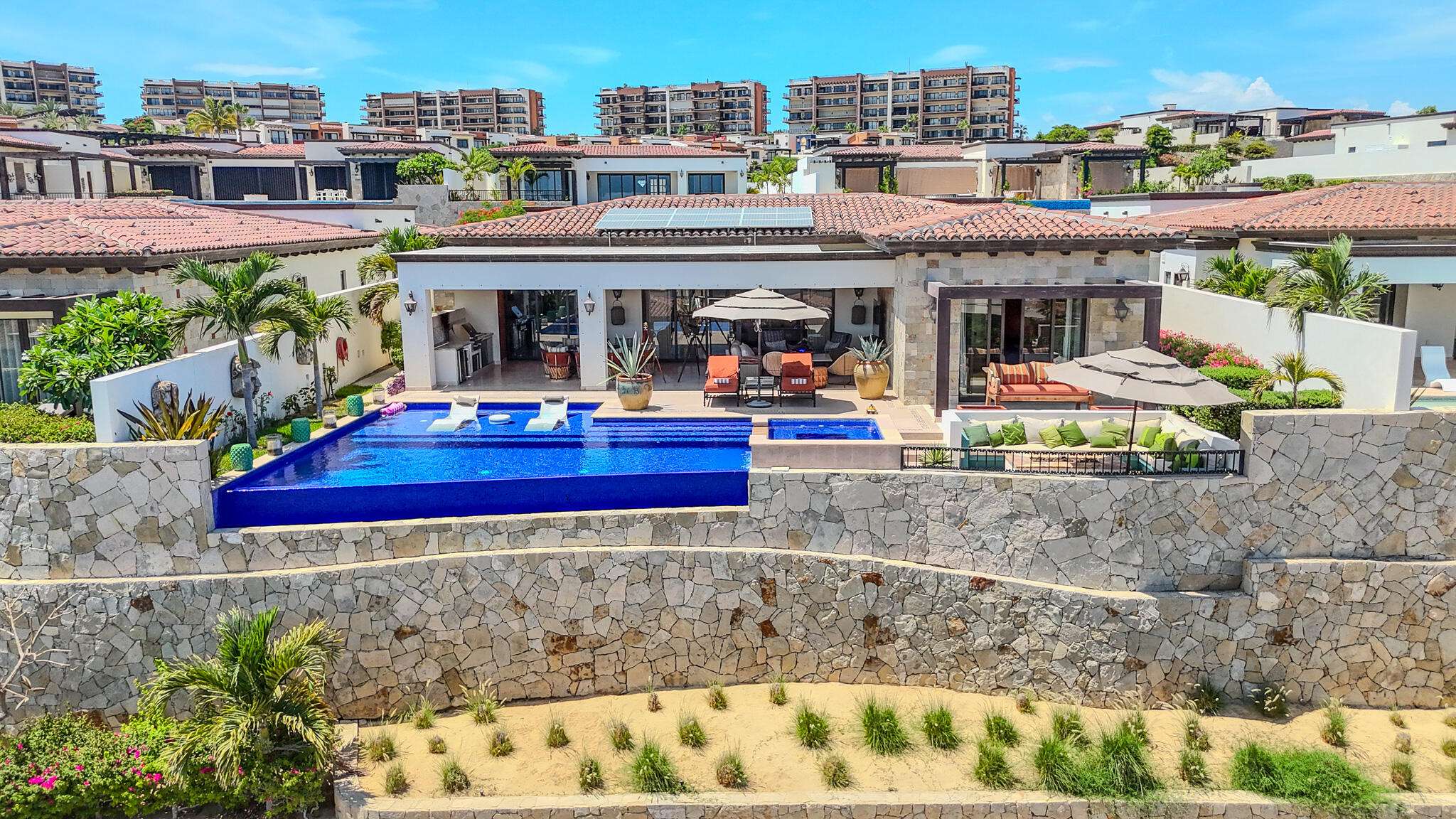 Los Cabos El Tule-Inland:General Rare investor opportunity in the San José Corridor. 2 luxury residences fully completed and move-in ready. 8 additional units with land secured and full blueprints in place -- ready to build to buyer's vision. At for sale