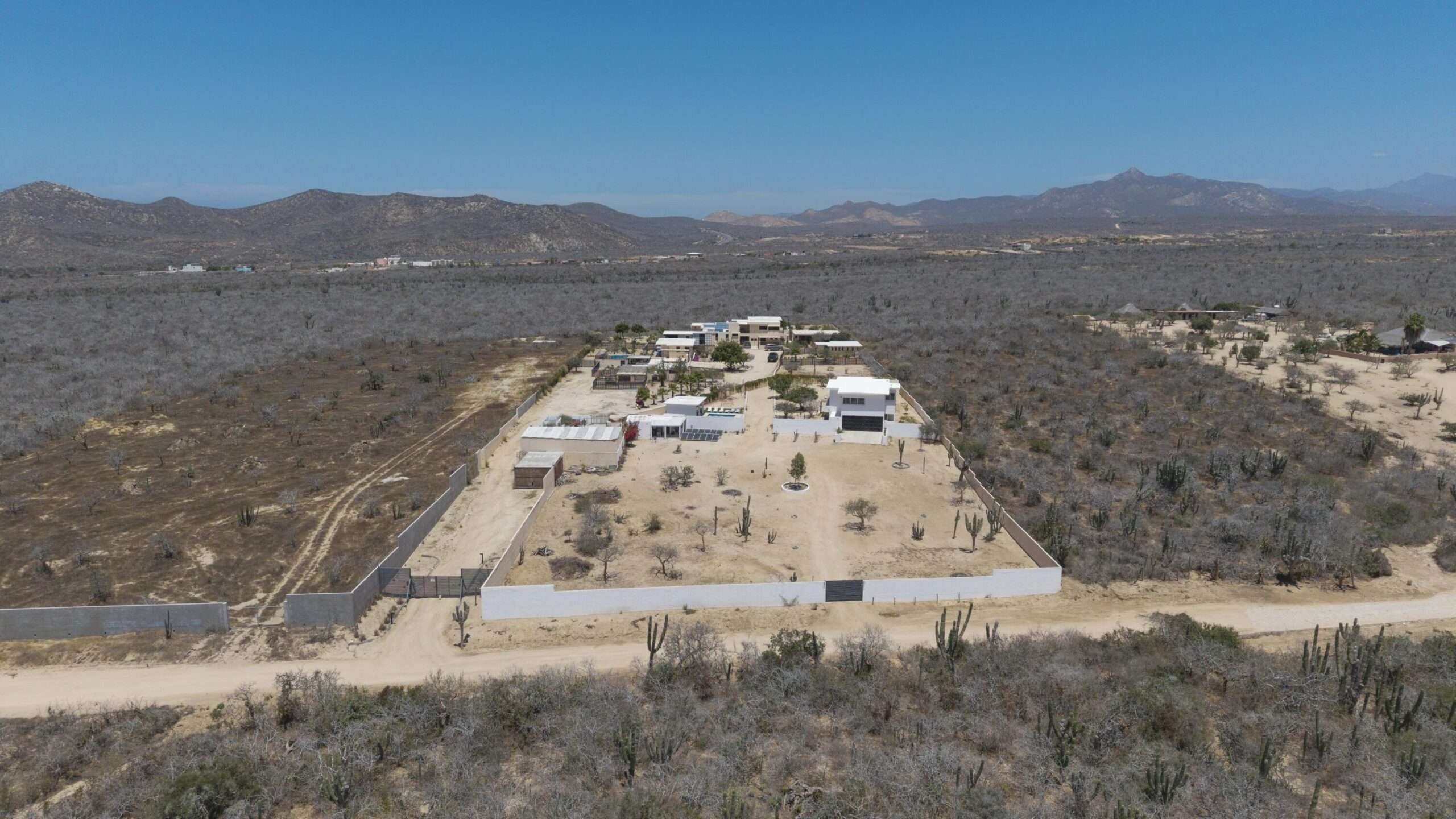 Los Cabos El Tule-Inland:General Rare investor opportunity in the San José Corridor. 2 luxury residences fully completed and move-in ready. 8 additional units with land secured and full blueprints in place -- ready to build to buyer's vision. At for sale