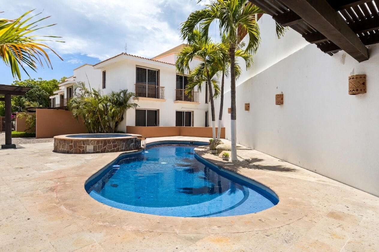 Los Cabos Santa Rita This charming townhome is located in a secluded enclave of eight in the exclusive neighborhood known as Pedregal de Cabo San Lucas just steps to town. This 2 bedroom 2.5 bathroom offers private access through an electric gate and a carport with a pergola. As well as a pool and BBQ available for residents. Beautiful top of the line finishes throughout. With an open concept layout, balconies in each bedroom, an open courtyard, walk-in closet, marble and granite counters add to the charm of this spacious townhome. Residents enjoy the local amenities redefining the Cabo lifestyle and to the most discerning individuals who call this their home away from home. From beach access where the sparkling waters of the Pacific Ocean contrast the sunset where you can watch the seasonal whales and turtle release, to a gym & spa offering treatments and a relaxation experience. Residents have exclusive access to establishments offering exquisite cuisine, The courts cafe offering breakfast & lunch as well as Fenix Restaurant offering day and night service. As well, in the heart of the development, with mountain for sale
