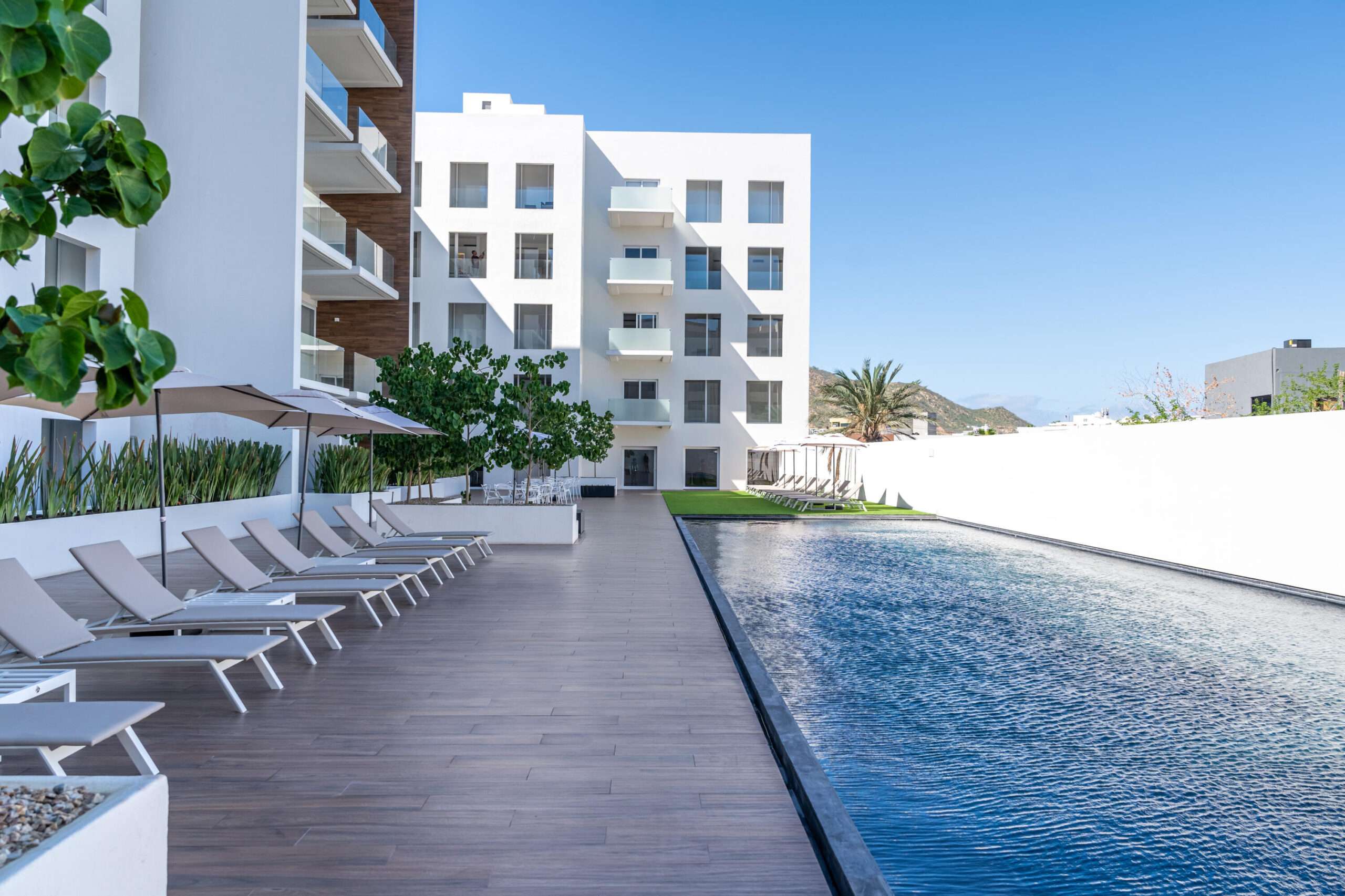 Los Cabos Marea Los Cabos Pelicano 402 is a turnkey 2-bedroom, 2-bathroom residence, fully furnished and move-in ready. Its open-concept layout seamlessly connects the living, dining, and kitchen areas to a spacious continuous terrace, also accessible from both bedrooms, creating effortless indoor-outdoor living. Designed to maximize privacy, natural light, and functionality, this home offers a peaceful and inviting atmosphere. Ideal as a full-time residence, vacation home, or investment property, it combines quality craftsmanship, contemporary finishes, and the added confidence of buying directly from the developer. for sale