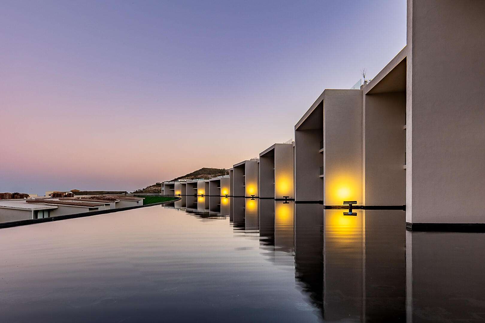 Los Cabos Cora SUNSET A 101- the crown jewel of the entire development. A rare 6-bedroom, 5.2-bath residence spanning two full living levels: the main floor plus a private underground bunker suite with its own living room, dining room, kitchen, bedrooms and baths -- ideal for multigenerational living or an income-producing guest retreat. Enjoy a private pool, jacuzzi, fire pit and BBQ area under an extended pergola, plus an extended terrace beside a tranquil espejo de agua. Ocean for sale